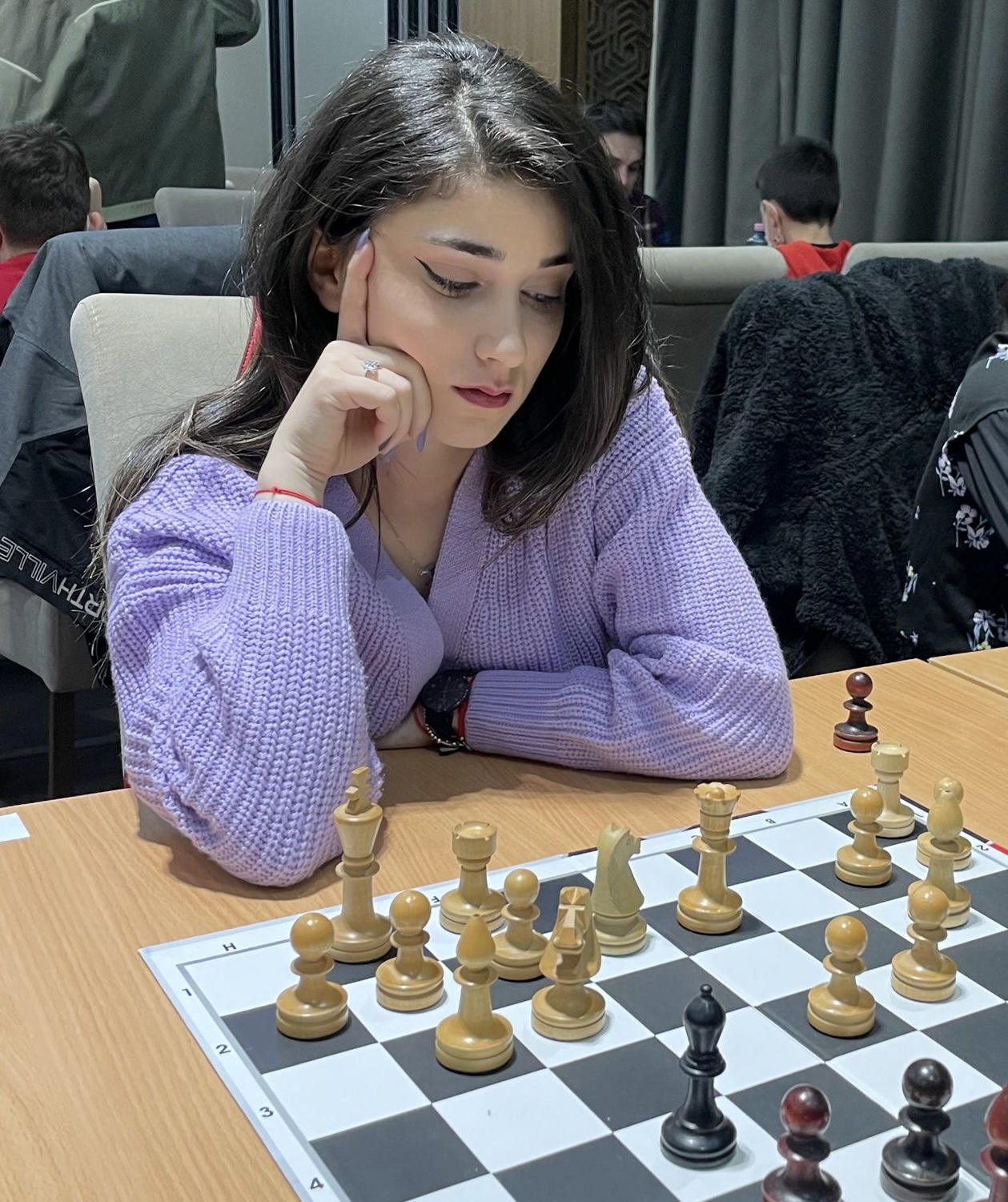 Maria at the chess board